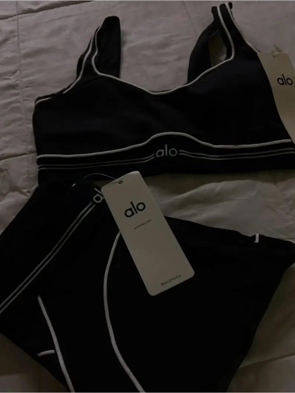 ALO set Yoga Black Sports Bra with matching leggings with White Piping